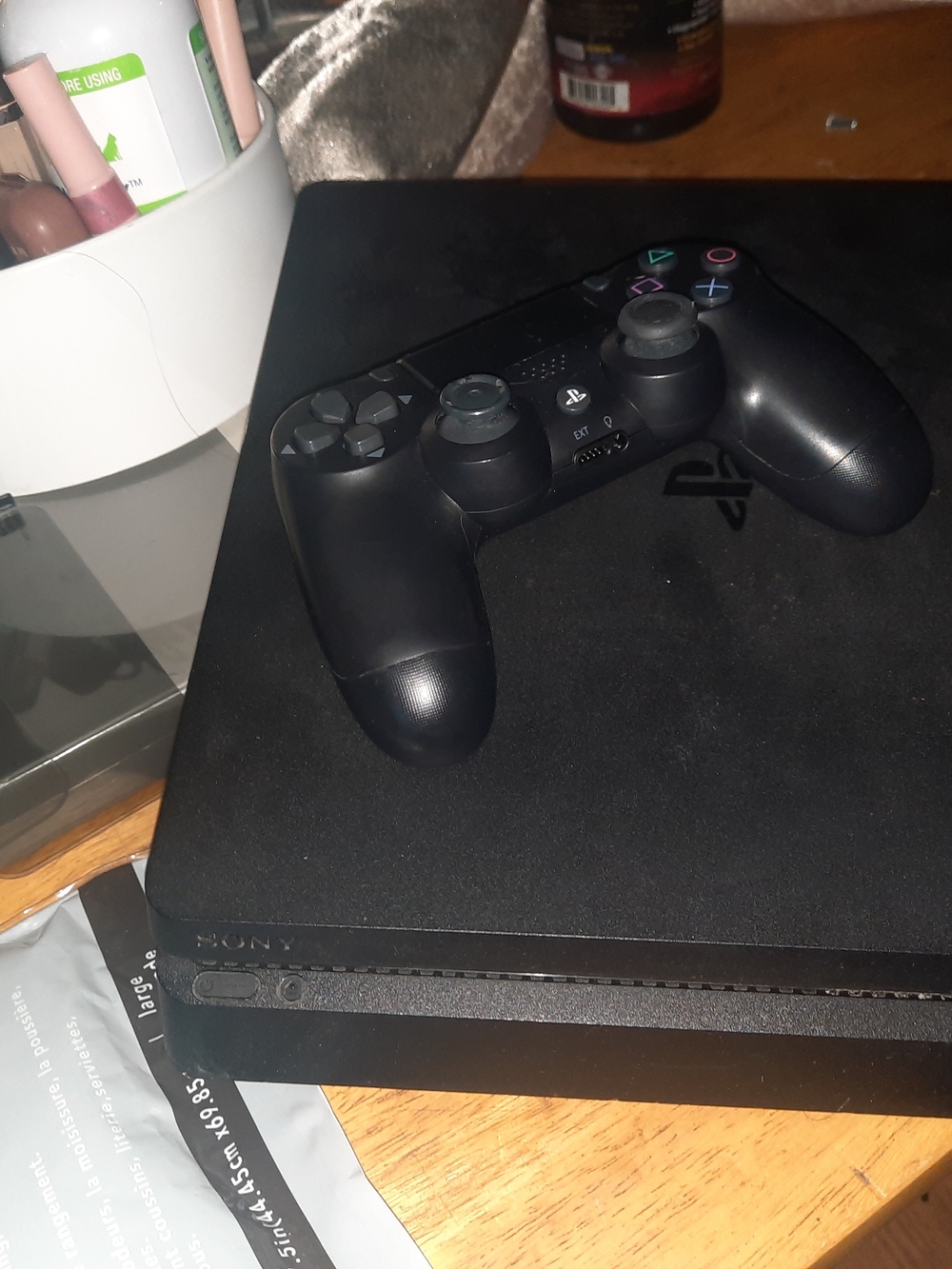 Sony PlayStation 4 Slim Console with Black DualShock 4 Wireless Controller